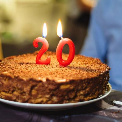 number-twenty-candles-on-a-homemade-chocolate-cake-2021-08-29-14-31-51-utc